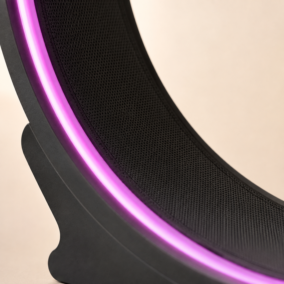 Close-up of the cat exercise wheel running surface and glowing magenta LED rim