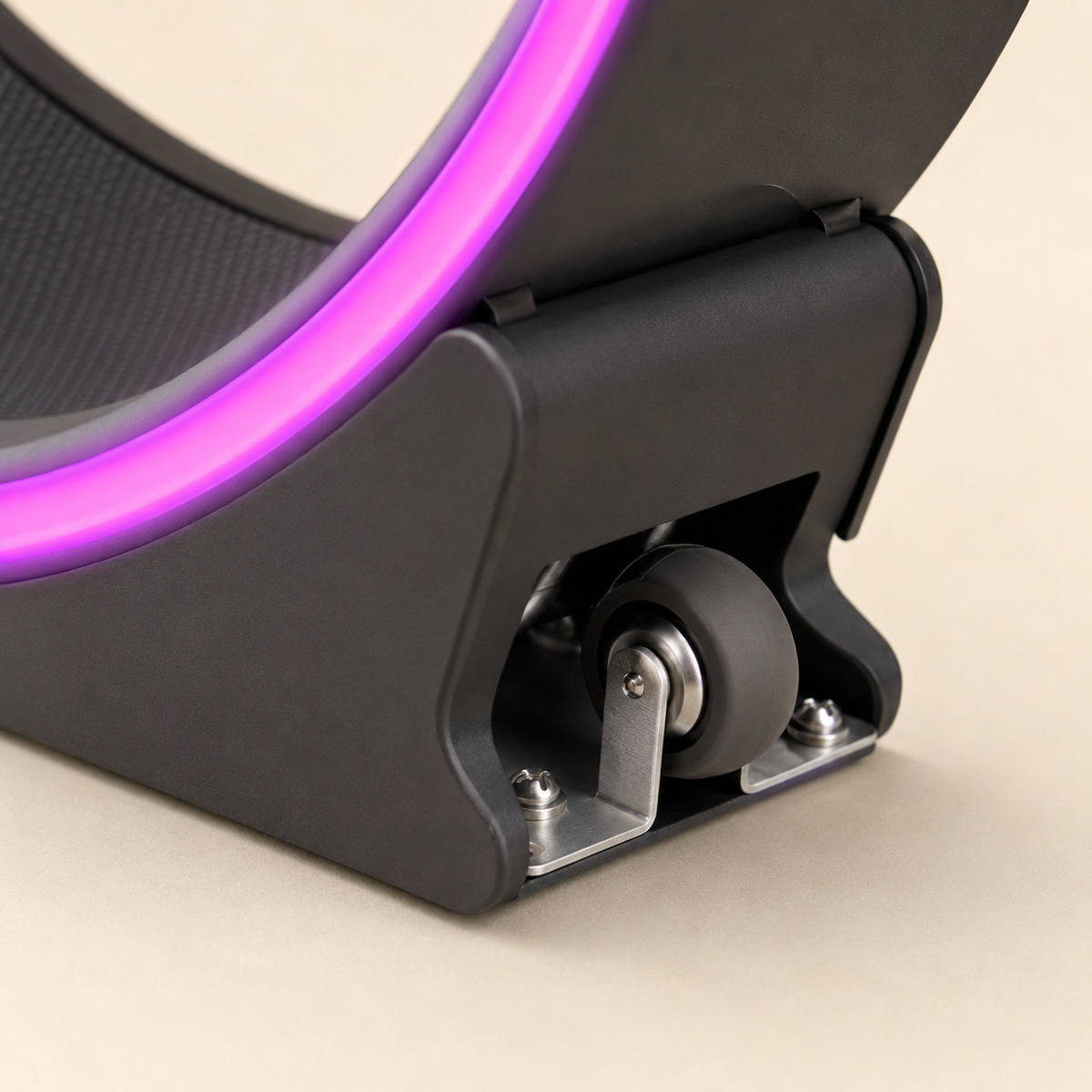 Close-up of the cat exercise wheel caster and metal mounting bracket at the base